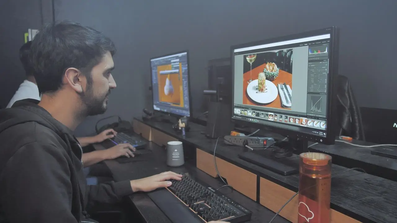 Two people work with design software